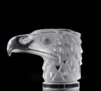 Lalique Crystal "Tete D'Aigle": DESCRIPTION: Lalique Eagle head sculpture paperweight "Tete D Aigle", signed "Lalique France" CIRCA: 20th CenturyORIGIN: FranceDIMENSIONS: H: 4 1/2" L: 5 1/4" W: 3 1/4"