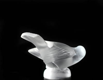 Lalique Crystal Sparrow Figurine: DESCRIPTION: Lalique "Sparrow" head under wing figure. One of four similar figurines. Signed "Lalique France"CIRCA: 20th CenturyORIGIN: FranceDIMENSIONS: H: 3 1/4" W: 4"