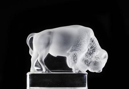 Lalique Crystal Bison Paperweight: DESCRIPTION: Lalique Crystal Buffalo Bison paperweight, frosted. Signed "Lalique France"CIRCA: 20th centuryORIGIN: FranceDIMENSIONS: H: 3 3/4 L: 5"