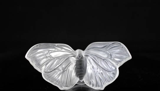 Lalique Butterfly Paperweight: DESCRIPTION: Lalique footed frosted crystal Butterfly paperweight, wings spread. Signed "Lalique France" on the bottom rim. CIRCA: 20th CenturyORIGIN: FranceDIMENSIONS: H: 2 1/8" L: 4 3/4" W: 2"