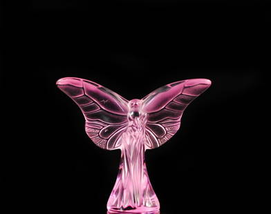 Lalique "Butterfly Rosee" Rose Color: DESCRIPTION: Lalique colored crystal "Butterfly Rosee" in rose color, signed "Lalique France" on the bottom rim. CIRCA: 20th CenturyORIGIN: FranceDIMENSIONS: H:: 3" L: 3 1/2"