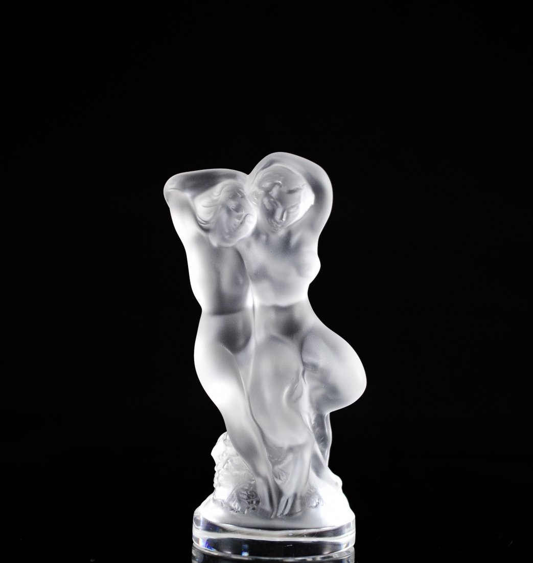 Lalique Crystal "Faune" Figurine: DESCRIPTION: Lalique "Faune" figurine, nude man and women romantically embraced signed "Lalique France" CIRCA: 20th Century ORIGIN: France DIMENSIONS: H: 5 3/8" W: 2 1/2"