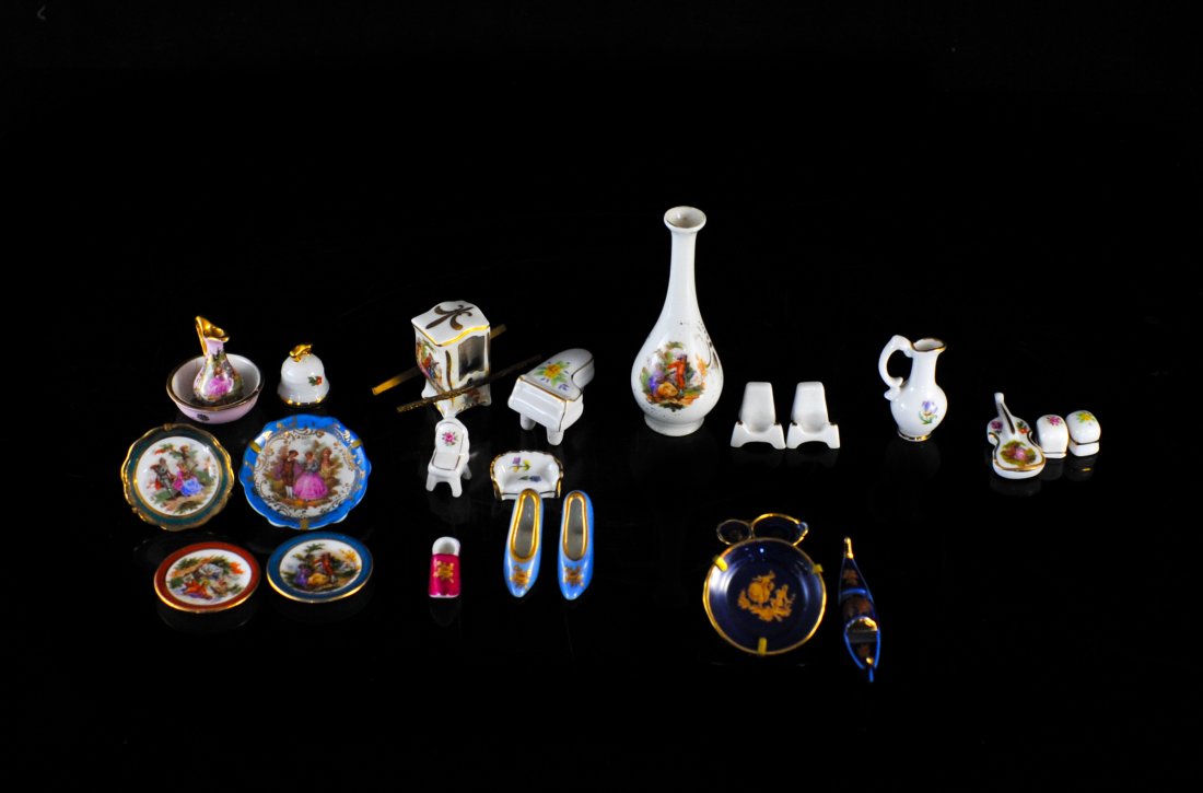 Lot of 24 Limoges France Miniatures: DESCRIPTION: Lot of antique Limoges France miniatures, set includes elegant victorian plates, pitchers, vases, furniture, musical instruments, shoes and a really unique horse carriage CIRCA: 20th Cent