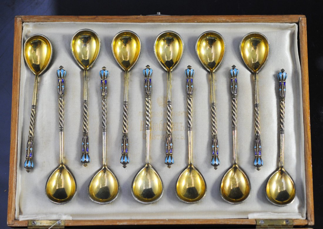 Set Of Twelve Russian Silver Enameled Spoons: DESCRIPTION: Set of twelve Russian sterling and enamel spoons. Absolutely stunning set of twelve hand crafted champleve enamel and sterling teaspoons. Multi colored floral motif on each spoon with a d