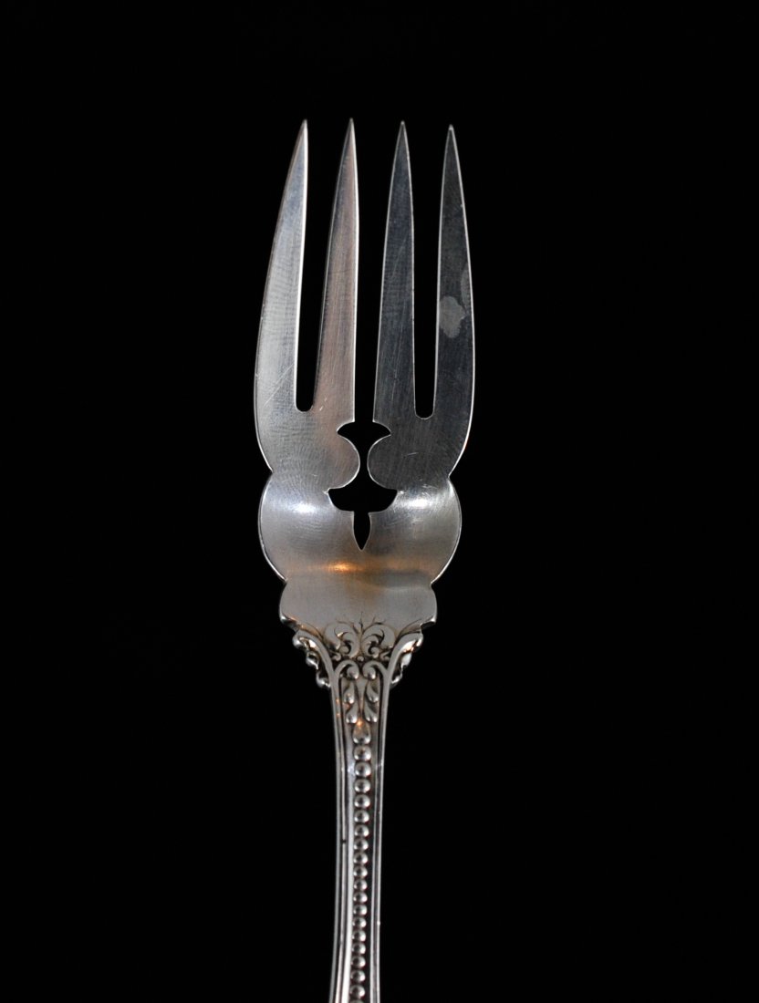 Antique Baroque Sterling Silver Fork: DESCRIPTION: Reed & Barton sterling silver fork CIRCA: 20th century ORIGIN: US DIMENSIONS: Length 7" Weight: 43g