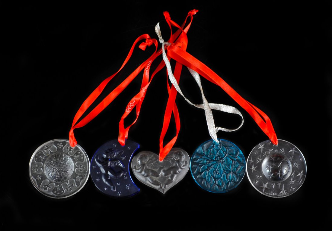 Lot Of Five Lalique Christmas Ornaments: DESCRIPTION: Lot of Five Lalique christmas ornaments includes sapphire crescent, celestial star, anastasia, turquoise noel misletoe and cherubs at heart. All signed lalique france CIRCA: 20th Ct. ORIG