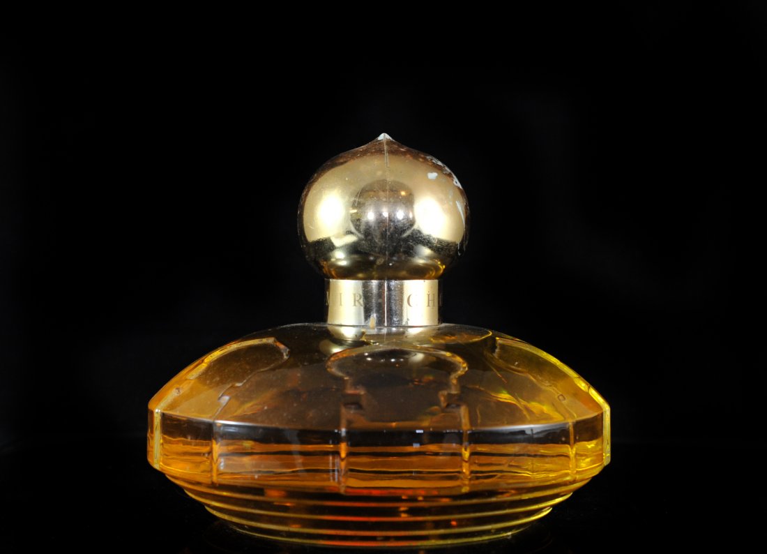Vintage Exta Large Chopard Casmir Perfume: DESCRIPTION: Rare collectors item, vintage extra large Chopard Casmir perfume. Beautiful glass bottle with arched pattern, a painted red lotus flower on the bottom of the bottle and a gold perfume top