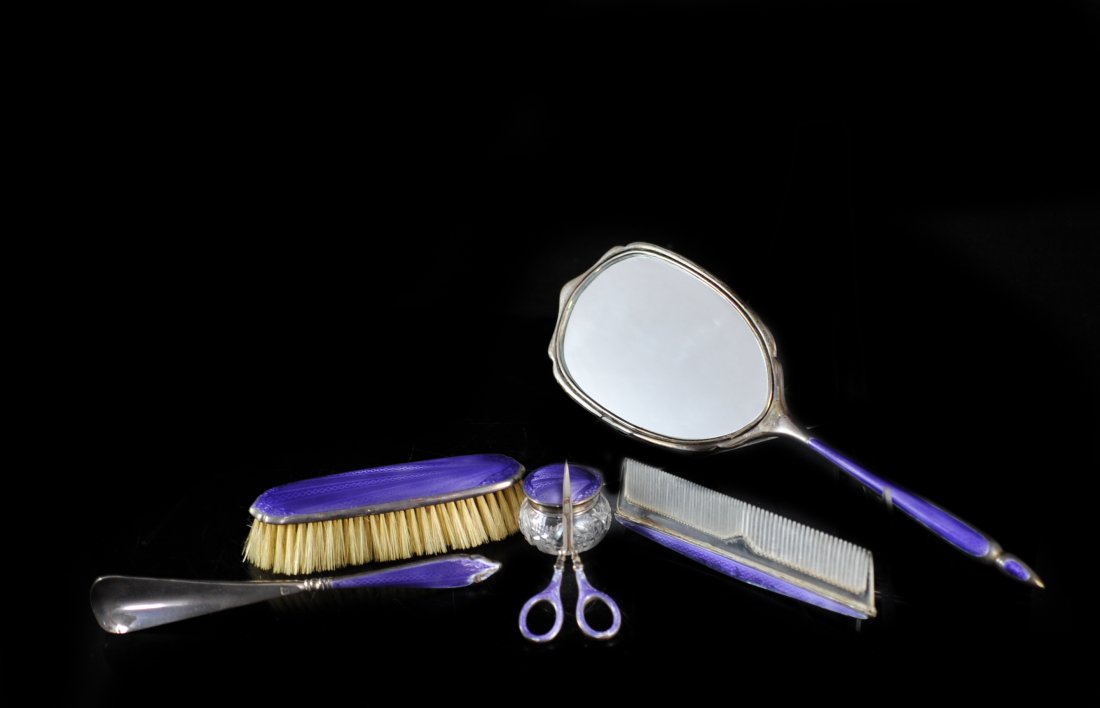 Antique Sterling Silver Enameled Dresser Set: DESCRIPTION: Six piece antique sterling silver & purple enameled dresser set. Hallmarked on each piece sterling with other markings. The set includes a brush, comb,shoe horn, hand mirror and trinket d