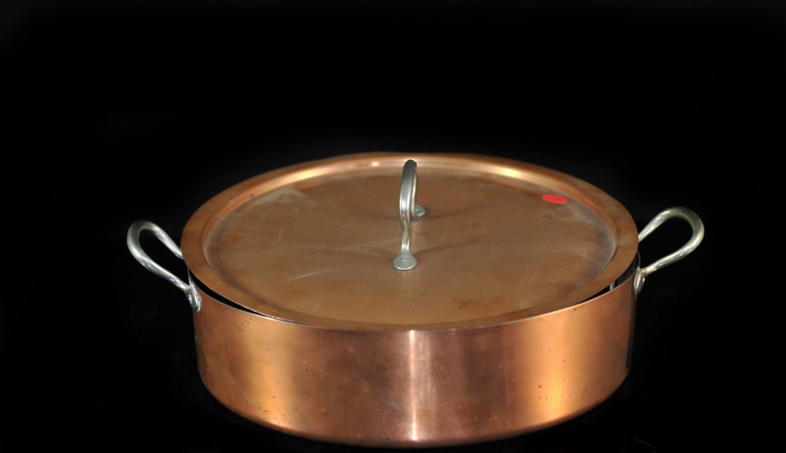 Large French Vintage Copper Stew Pan: DESCRIPTION: Large French vintage copper stew casserole oven to table pan with copper lid and durable tin-lined interior with riveted stainless-steel handles. Illegible French hallmark on the bottom o
