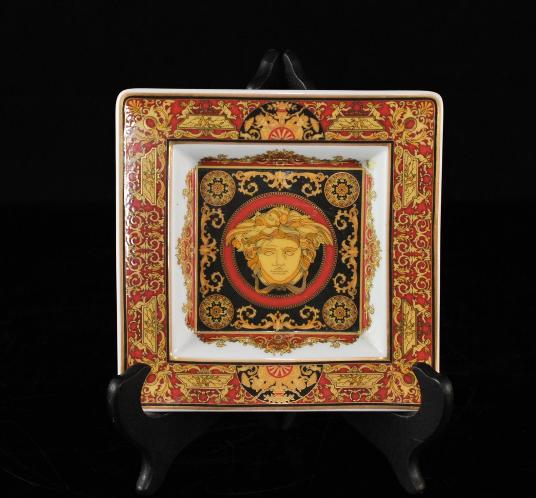 Versace Rosenthal "Medusa" Ashtray: DESCRIPTION: Versace Rosenthal "Medusa" ashtray features in gilded porcelain the "Medusa" print with a medusa head in the middle. Studio-linie Marked on bottom "Rosenthal Versace" Germany. CIRCA: Late
