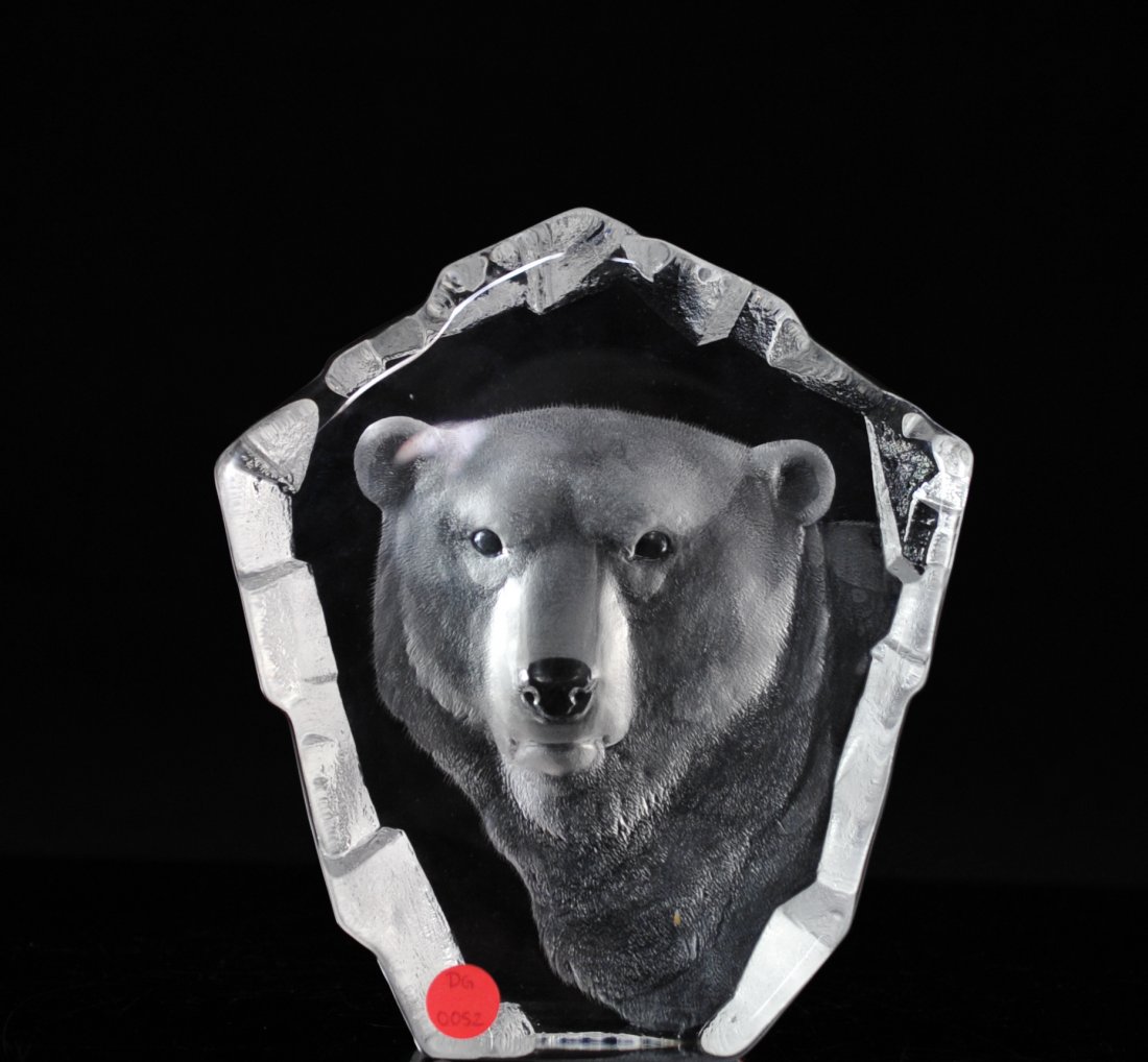 Mat Johansson Bear Crystal: DESCRIPTION: Mat Johansson polar bear crystal sculpture features a bear with dark eyes gazing forward. The composition has been carefully etched by hand on the rear surface so that the design can be v