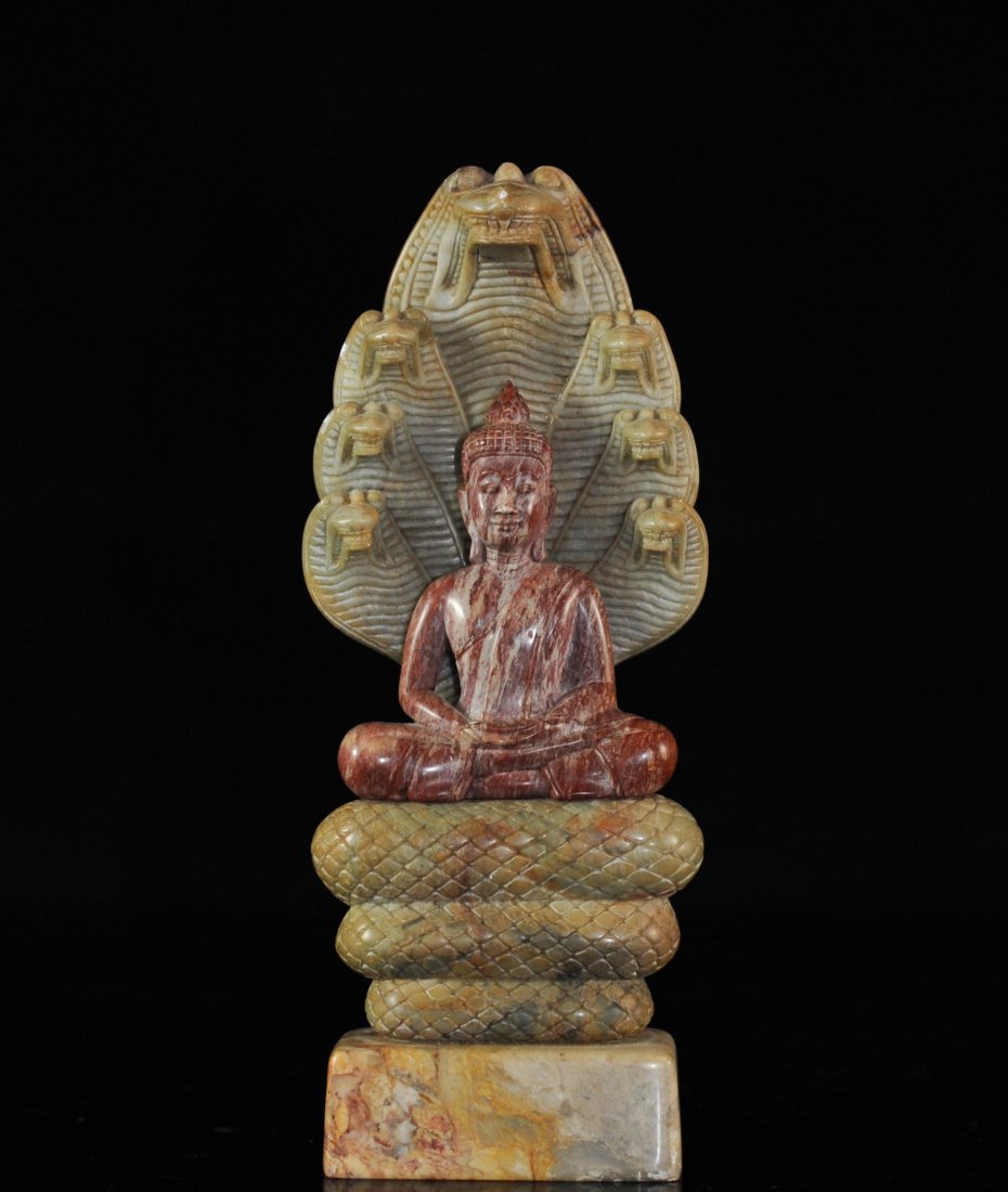 Hand Carved Soapstone Of Indian God: DESCRIPTION: Hand carved soapstone of indian god dipicits Naga sitting centered with seven cobra snakes emerging behind him. Marked on bottom with Indian lettering. CIRCA: Mid 20th Ct. ORIGIN: India D