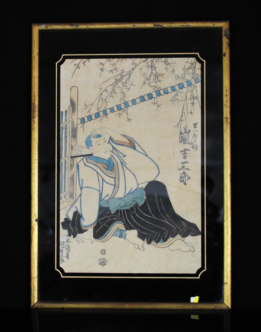 Antique Japanese Painting On Paper Framed: DESCRIPTION: Antique Japanese painting on paper of a man sitting down holding his head.The base color is off white with blue and black accents. There are Japanese symbols written on the middle right s