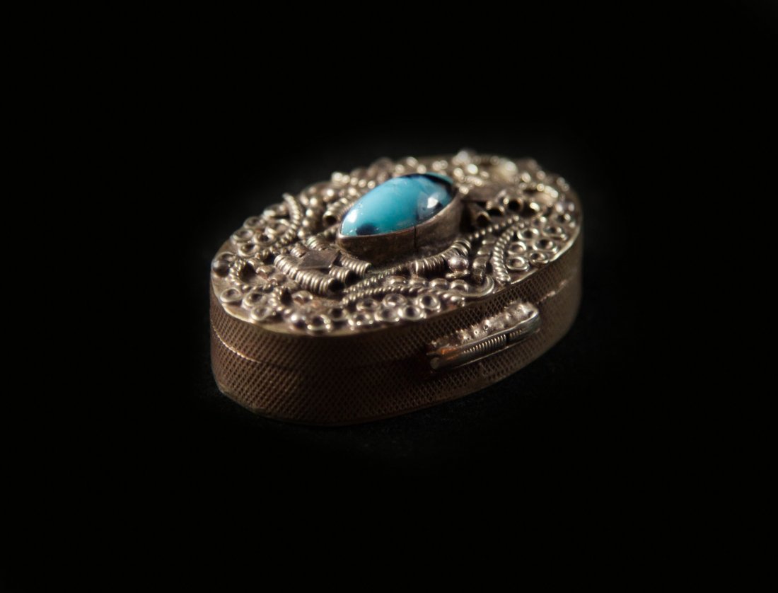 Vintage 800 Silver Pill Box: DESCRIPTION: Vintage 800 silver oval pill box with turquise trinket. Hallmarked "800" on bottom. Weighs a total of 22 grams. CIRCA: 20th Ct. ORIGIN: Italy DIMENSIONS: L: 1" W: 0.5"