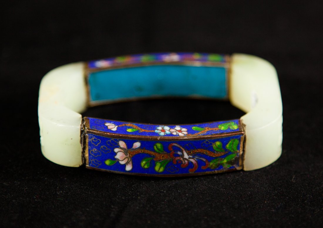 Jade & Cloisonne Cuff: DESCRIPTION: Gorgeous cloisonné and jade cuff. This cuff is a mixture between jade and cloisonné intertwined within one piece. The cloisonné design involves a deep blue and multi color floral motif