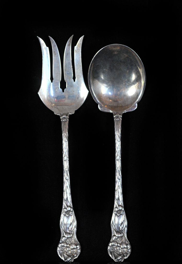 Walker & Hall Sterling Sivler Serving Utensils: DESCRIPTION: Set of two sterling silver serving fork and spoon/ Fork and spoon feature a floral design along the handle. Hallmarked on back "Sterling Silver" & Walker and Hall hallmark. Weighs 315 gra