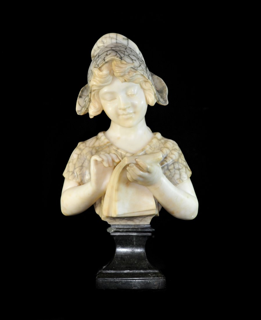 A. Adolfo (1880-1930) Marble Bust: DESCRIPTION: Marble bust dipicts a young lady with a headress writing. The busts sits on a black pedestal and features a mixture of white carrara, calcatta and black marble. Small chip on the corner o