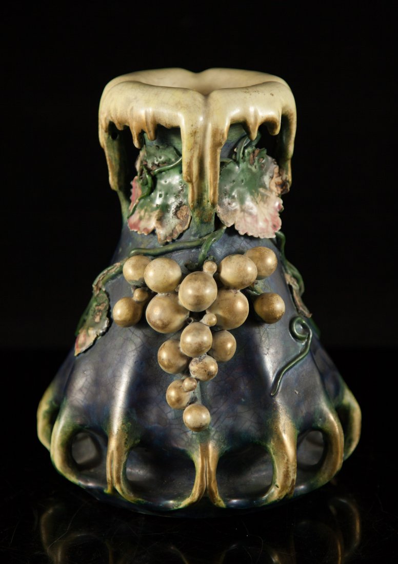 Art Nouveau Emphora EDDA Vase: DESCRIPTION: Art nouveau Amphora pottery vase from limited edition "EDDA". The vase features hanging grapes and leaves from an amethyst color ground. Embossed EDDA in triangle type hallmark and very h