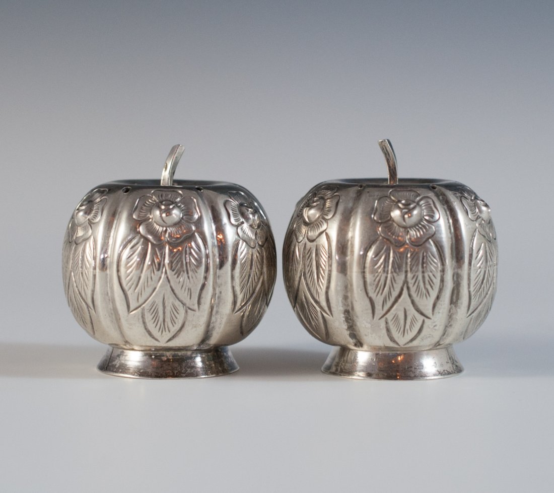 Sanborns Sterling Salt Cellars: DESCRIPTION: A beautiful pair of Sanborns sterling silver salt cellars in the sahpe of a fruit with floral design around the body and screw on botttoms to refill. Hallmarked on the bottom "Sanborns Me