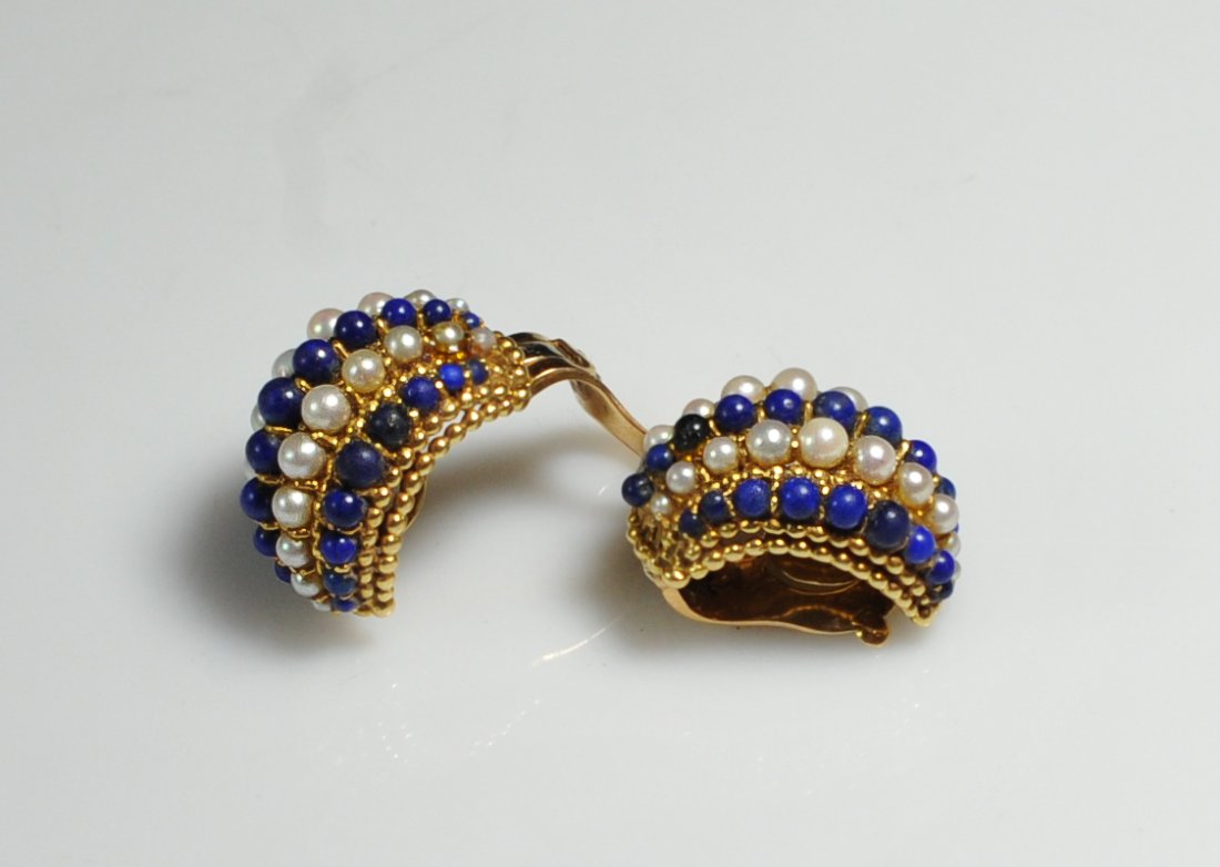 Van Cleef & Arpels Earrings: DESCRIPTION: Vintage Van Cleef & Arpels clip on earrings. Made of 18K gold, cultured pearls and lapis. Hallmarked "VCA", "Vin # 14049". Marked "750" and 62". Comes with the original jewelry bag. CIRCA