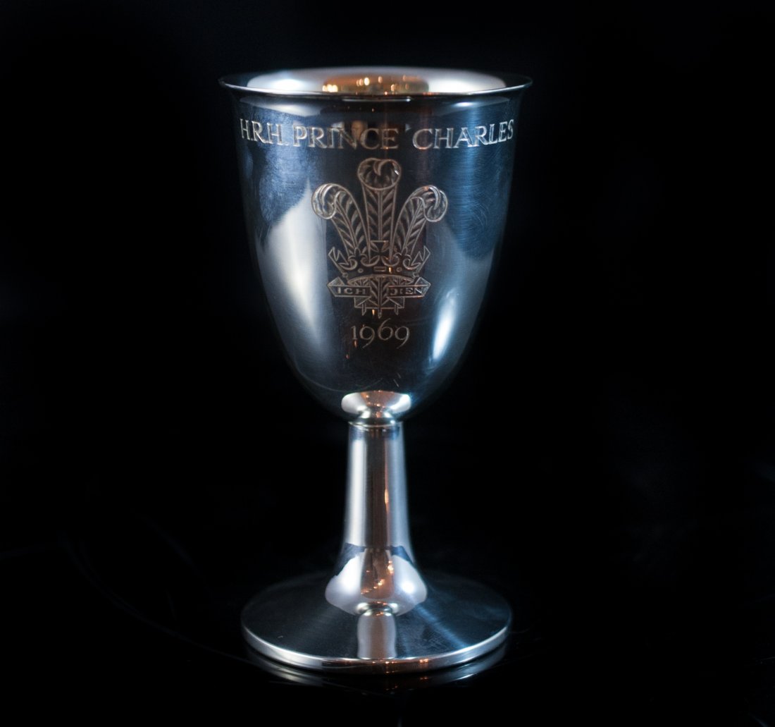 Silver English Chalice: DESCRIPTION: Sterling silver chalice features a smooth design engraved in the front "H.R.H Prince Charles 1969" with a seal in the center. The back is marked "T&S" with appropriate english hallmarks. 