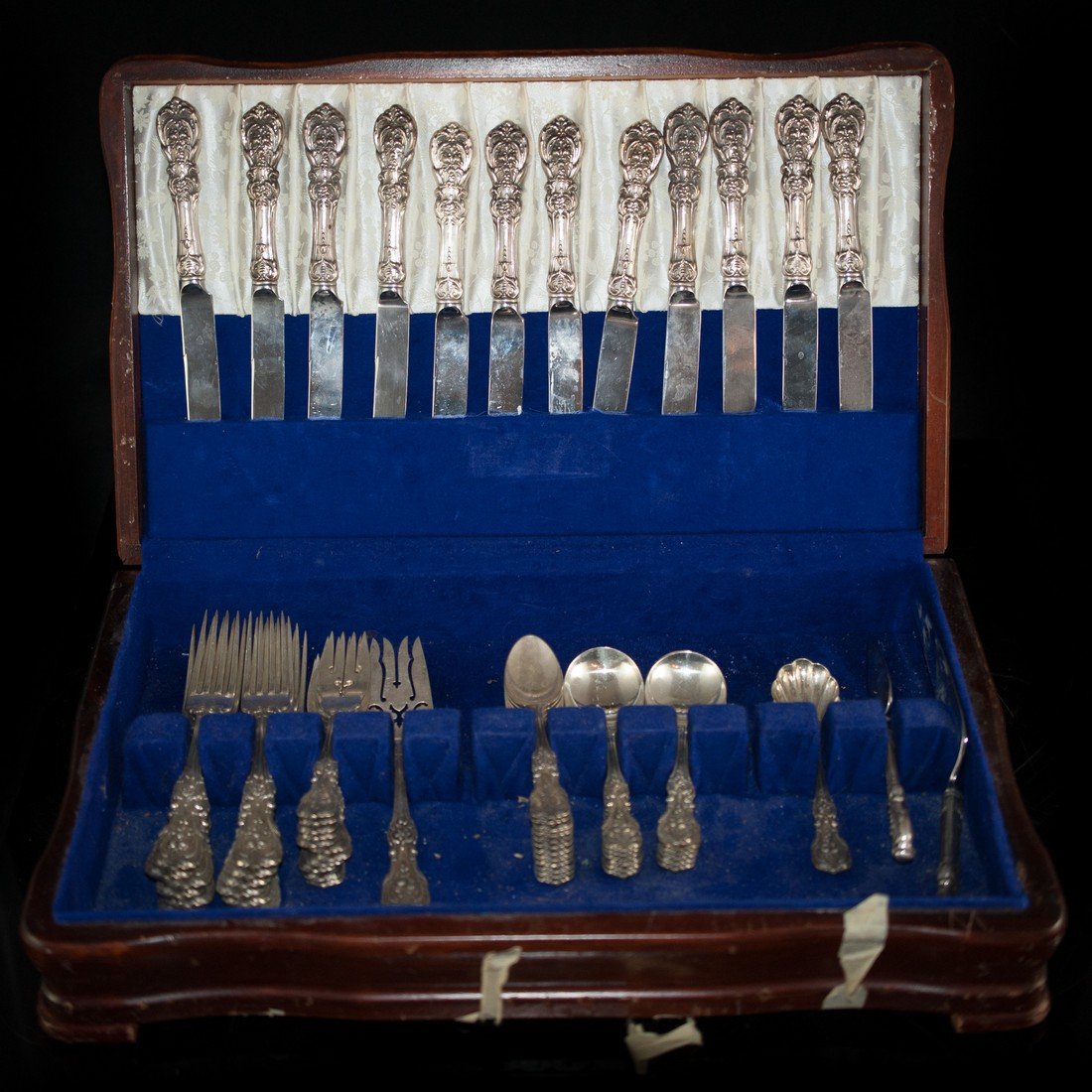 Reed & Barton Sterling Silverware Set: DESCRIPTION: An elegant dinner silverware set by the company Reed & Barton made in the "Francis I" pattern. The knives and cake servers are made of stainless steel and stamped "Mirrorstele", the compa