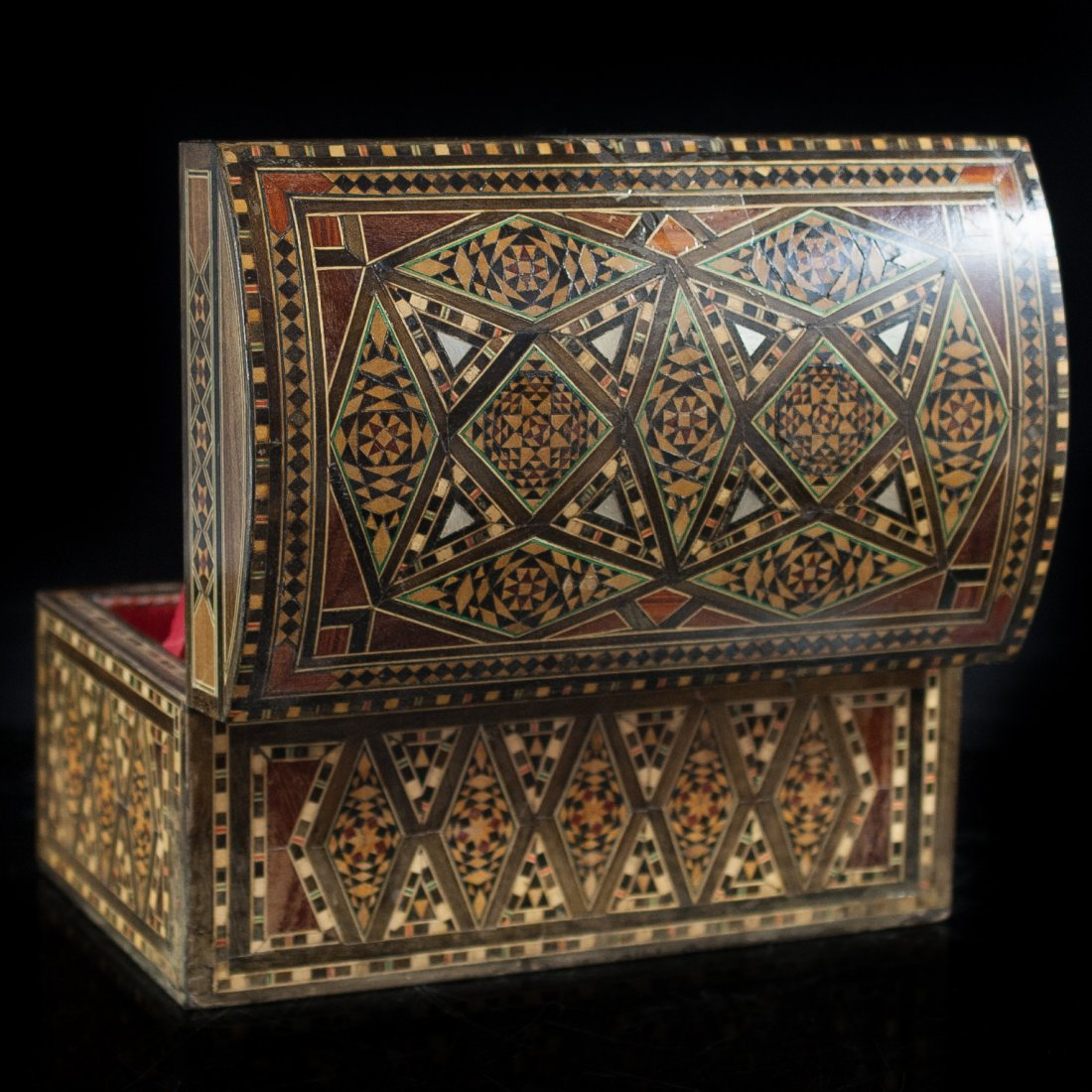 Moroccan Wooden Box: DESCRIPTION: Moroccans are famous for their beautiful inlay work. Using tiny pieces of mother-of-pearl, shell, lemon tree and Thuja wood stunning complex geometric designs are created entirely by hand