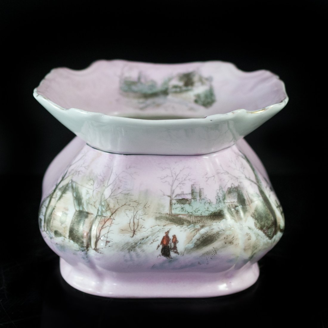 Limoges Porcelain Squared Vase: DESCRIPTION: Limoges porcelain vase features a square shaped design with a ruffled rim, the vase has a light pink ground color with painted winter scenes. Marked on the bottom "Limoges France" CIRCA: 