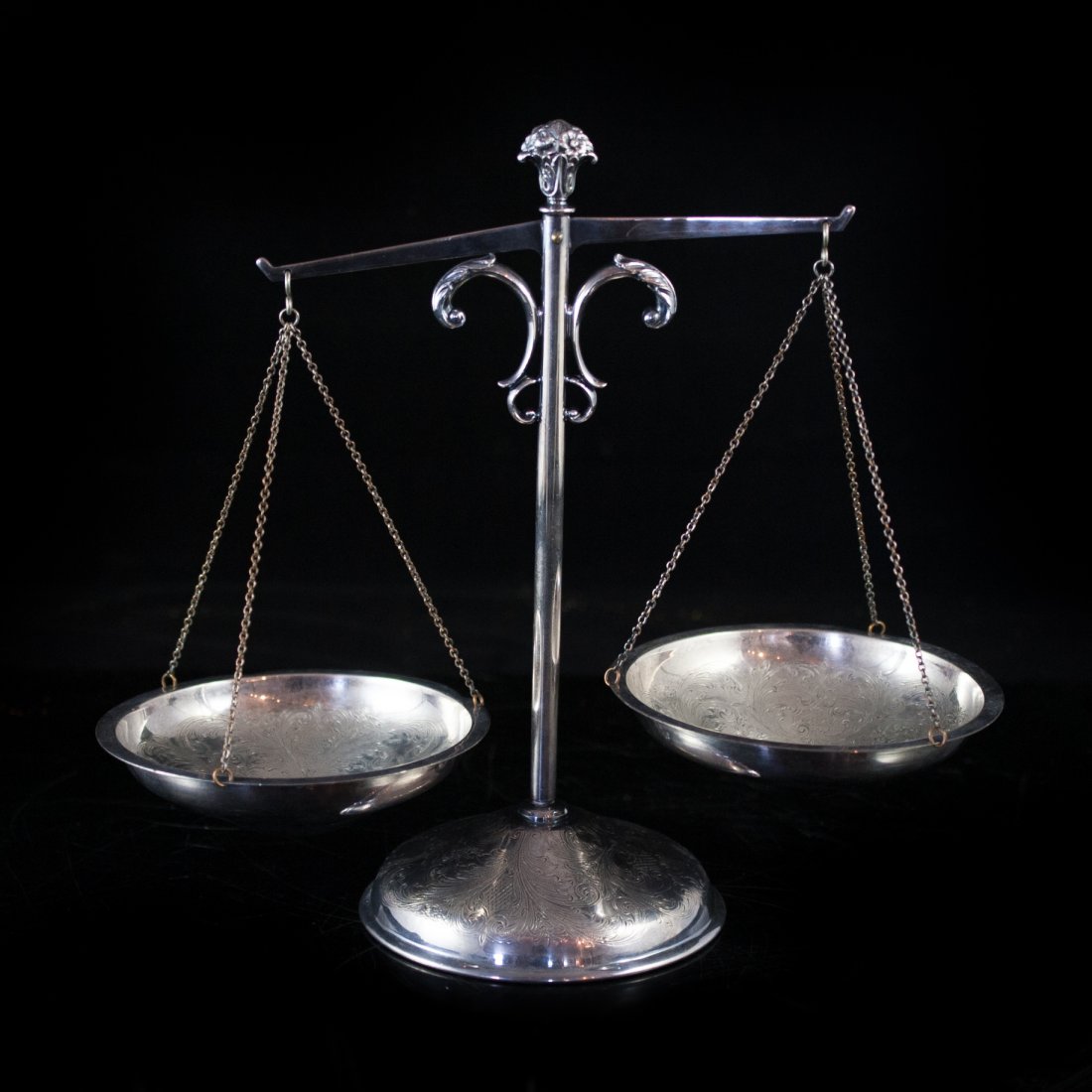 Antique Silver Plated Scale: DESCRIPTION: A antique scale with intricate sculpted detail in a plume-like designs on the base. The pole of the scale also has decorative sculpted plumes on the sides and the top of the pole is adorn