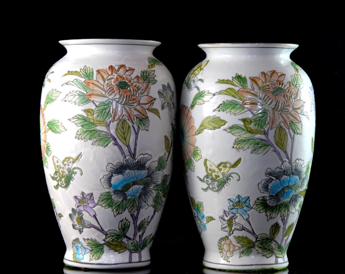 Pair Of Chinese Hand Painted Porcelain Vases: DESCRIPTION: Pair of Decorative Chinese hand painted porcelain vases. White glazed ground color with multi colored hand painted flower branches and butterflies. Soft subtle colors throughout. No crack