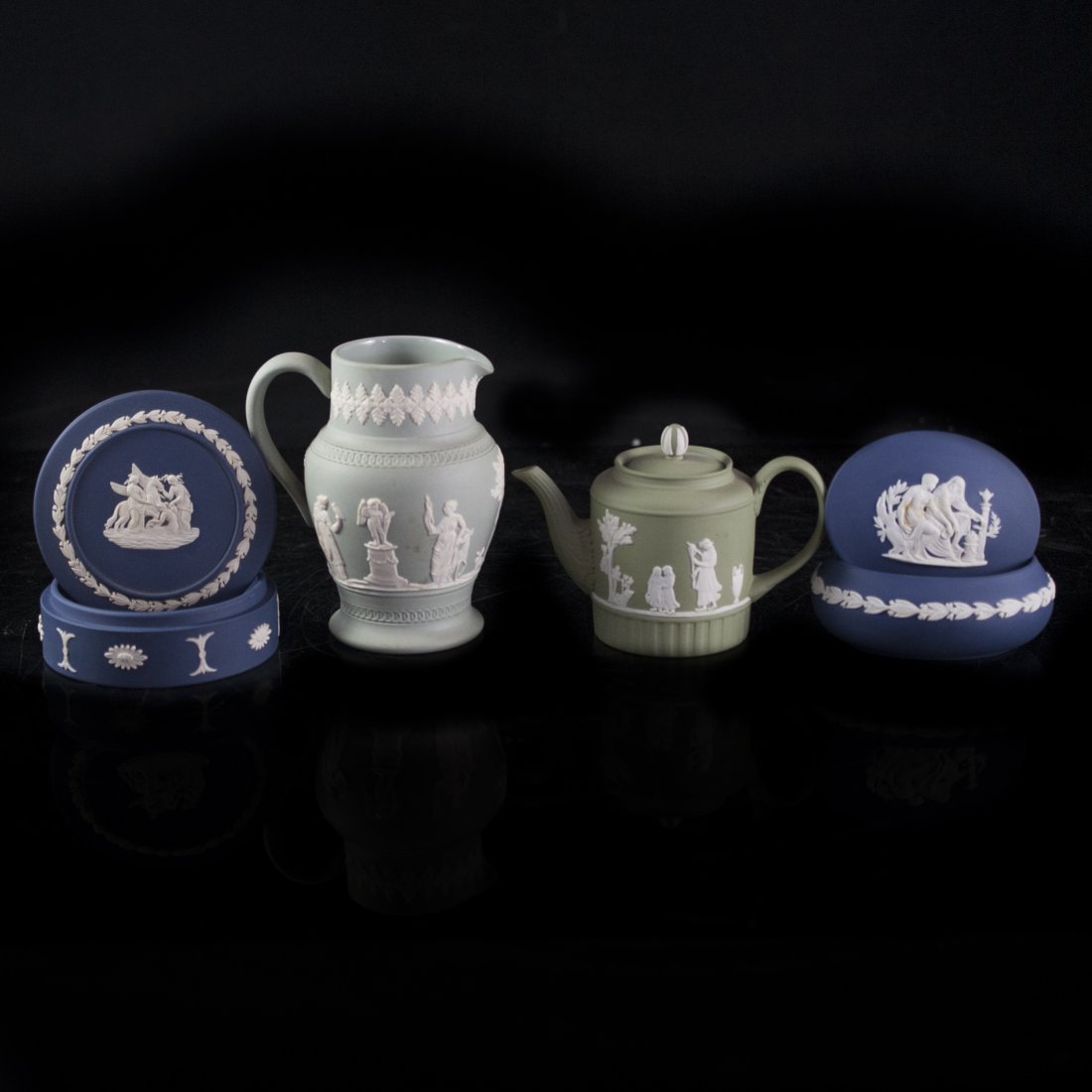 Lot of Wedgwood Royal Blue & Green Jasperware: DESCRIPTION:Collection of rare Jasperware by Wedgwood in royal blue and green. Features a hand signed oval container signed by Lord Wedgwood in 1993, a circular container featuring Greco-Roman figures