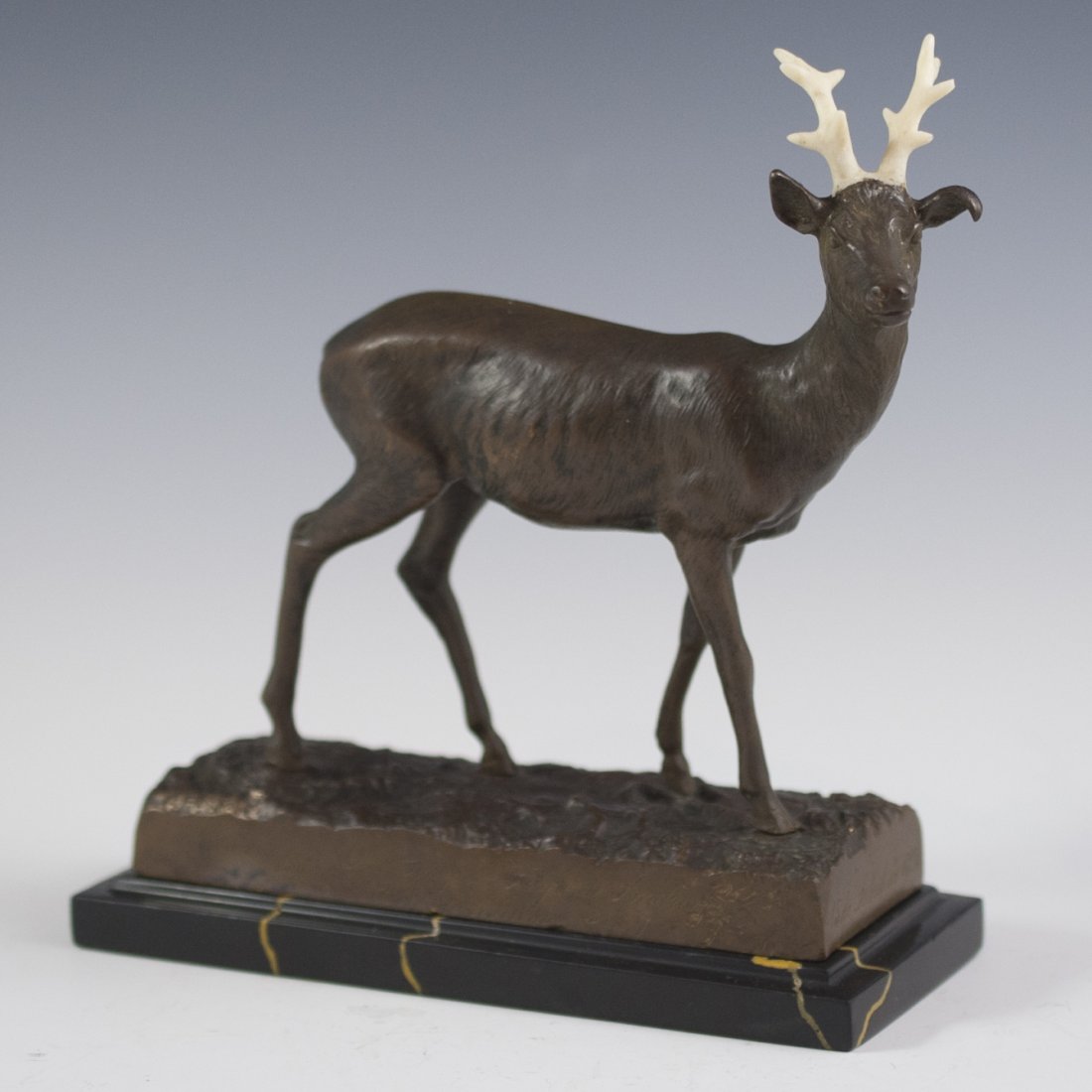 Raphael Febrari(-1928) Bronze Sculpture: DESCRIPTION:Highly detailed bronze figurine of a deer with bone antlers. Interesting history attached to this piece as it is marked: "Ganado por el Dr. Gonzalo Freyre De Andrade" who was the brother o