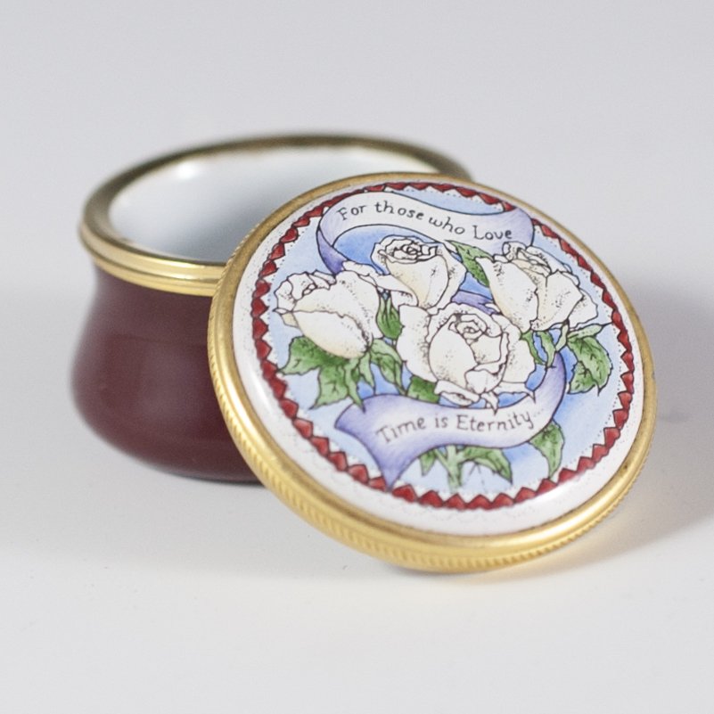 Staffordshire Enamels Pill Box: DESCRIPTION:Porcelain pill box by Staffordshire Enamels commemorating the life of Princess Diana. Features a bouquet of roses with ribbons marked" For Those Who Love Time Is Eternity" and marked on th