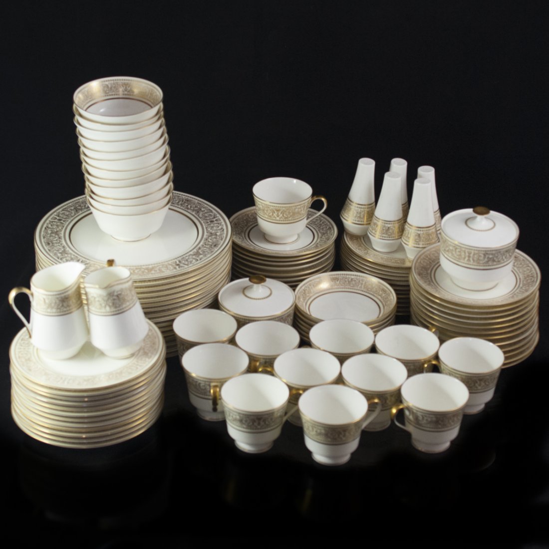 Mikasa Oberlin Bone China Set: DESCRIPTION:Mikasa bone china set. Comprises of 12 cups, 12 smaller cup dishes, 12 larger cup dishes, 12 small plates, 12 medium plates, and 16 large plates, 5 salt and pepper shakers, 2 creamers, 2 s