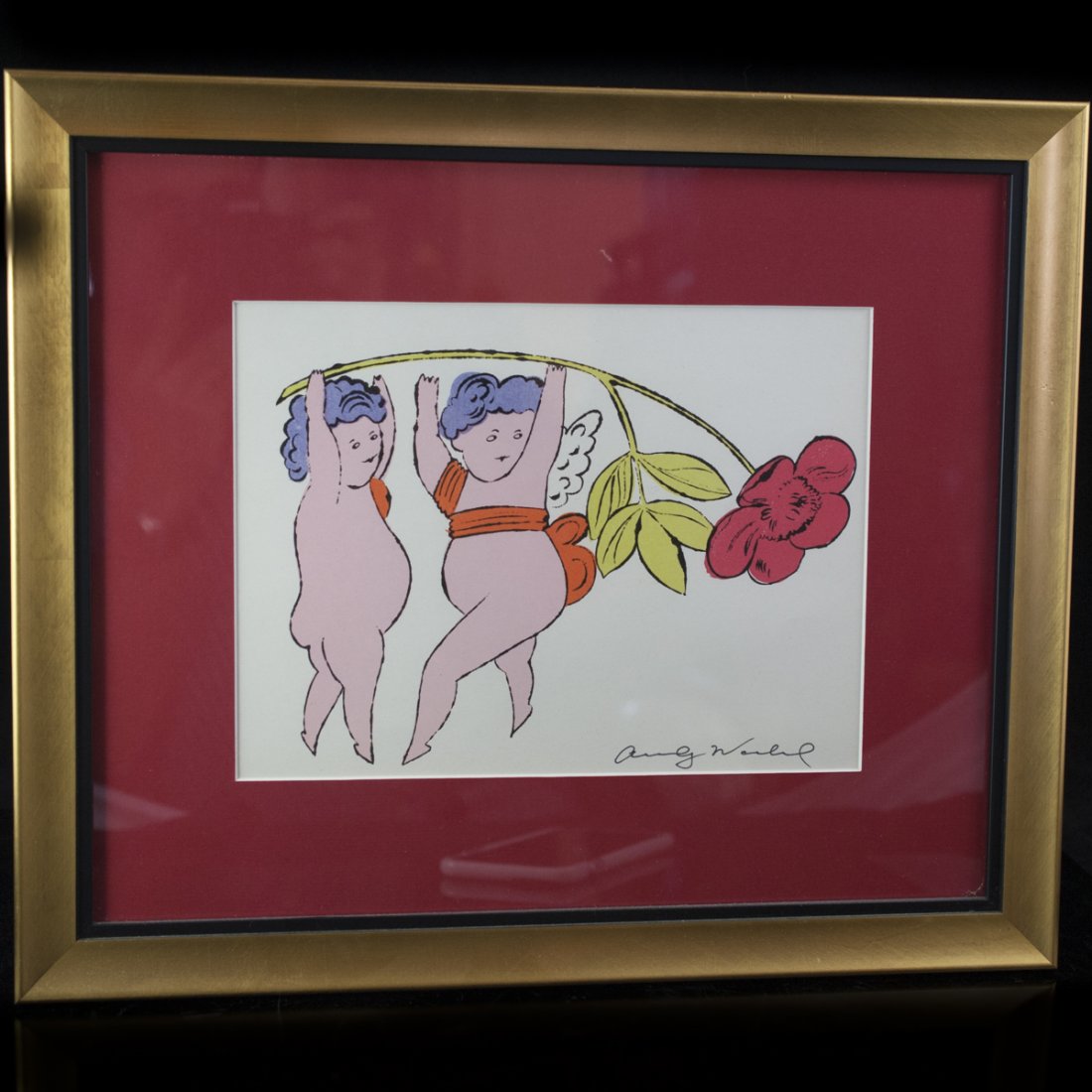 Andy Warhol Print: DESCRIPTION:Andy Warhol print depicting two nude woman holding up a flower above their hands. signed on the lower right hand side. CIRCA:20th Ct. ORIGIN:USA DIMENSIONS:(With Frame) H:15" L:18" (Withou