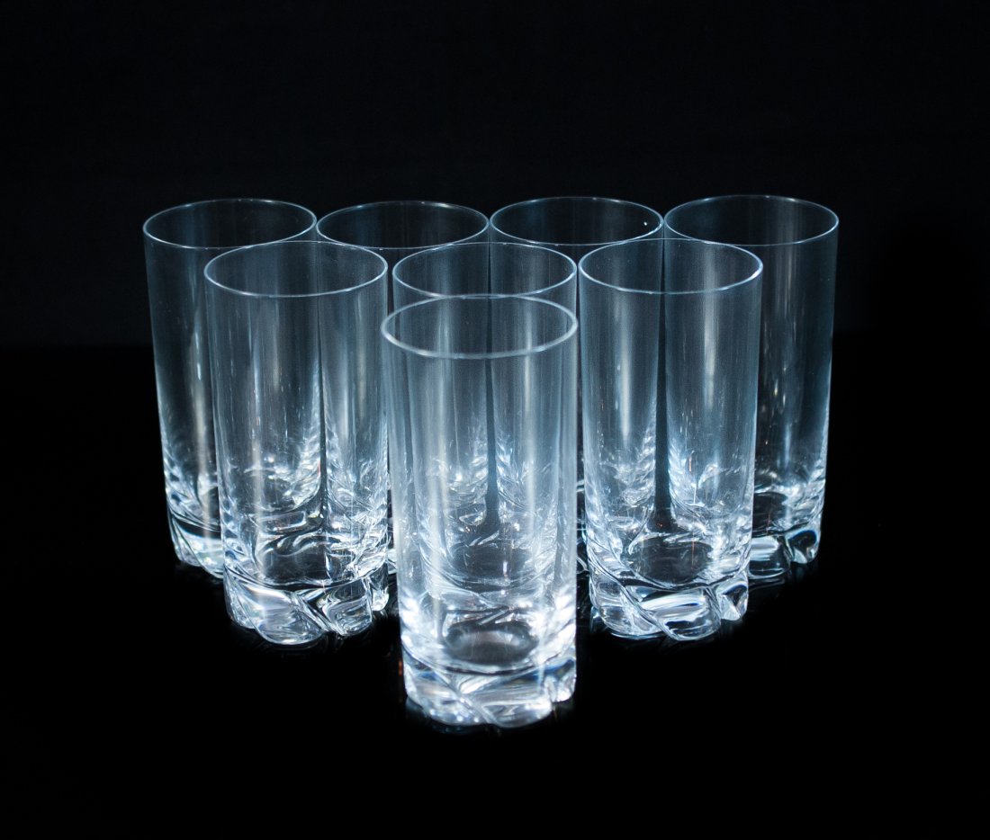 Set Of 8 Daum Crystal Cups: DESCRIPTION: Set of 8 Daum crystal cups featuring a rock formation design at the base. Signed on the bottom “Daum France”. CIRCA: 20th Ct. ORIGIN: France DIMENSIONS: H: 5" W: 2.25"