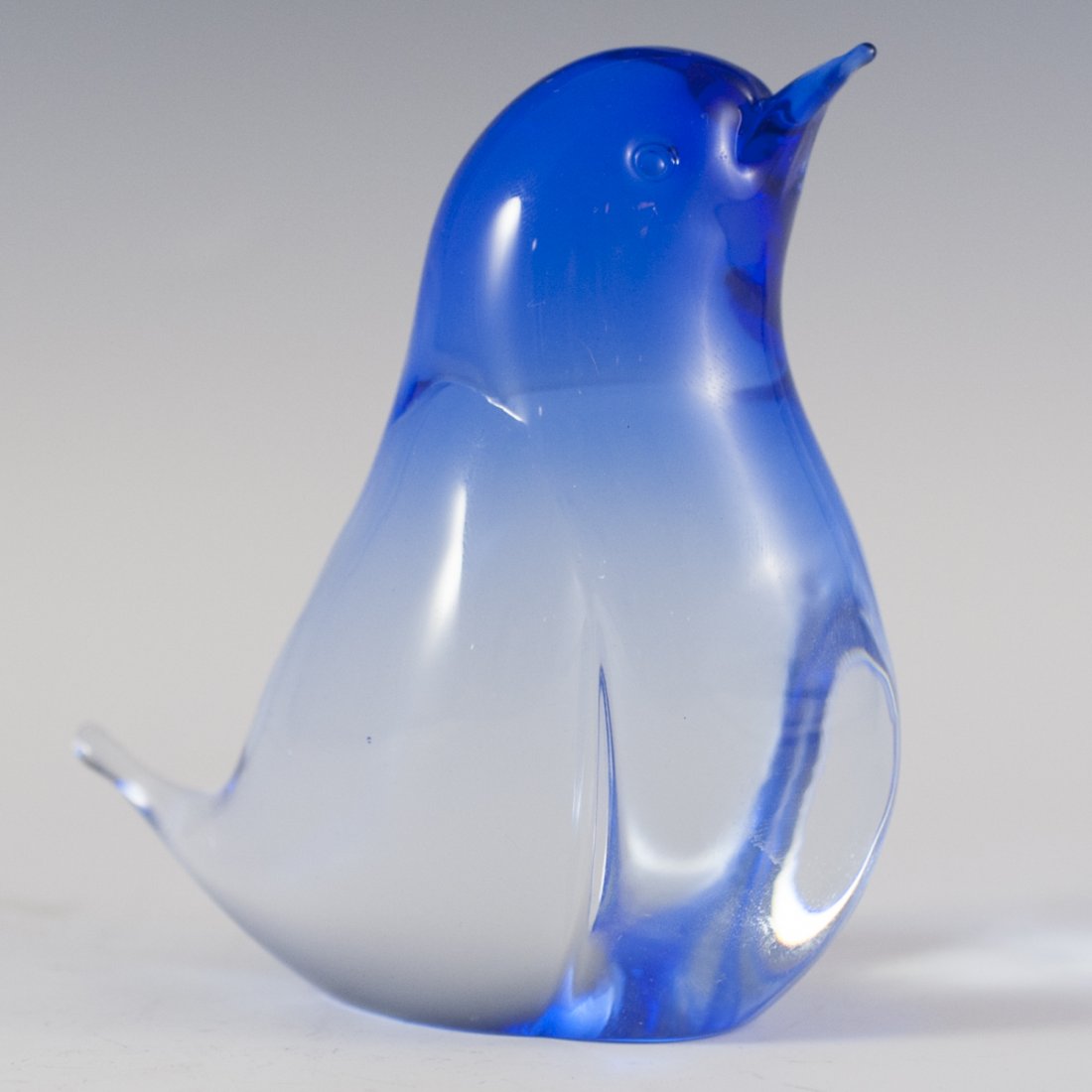 Oggetti Murano Glass Dove: DESCRIPTION:Oggetti Murano glass dove. Features cobalt blue hues along the head and tail and marked:"Oggetti Italy" CIRCA:20th Ct. ORIGIN:Italy DIMENSIONS:H:4" L:3.5" W:2"