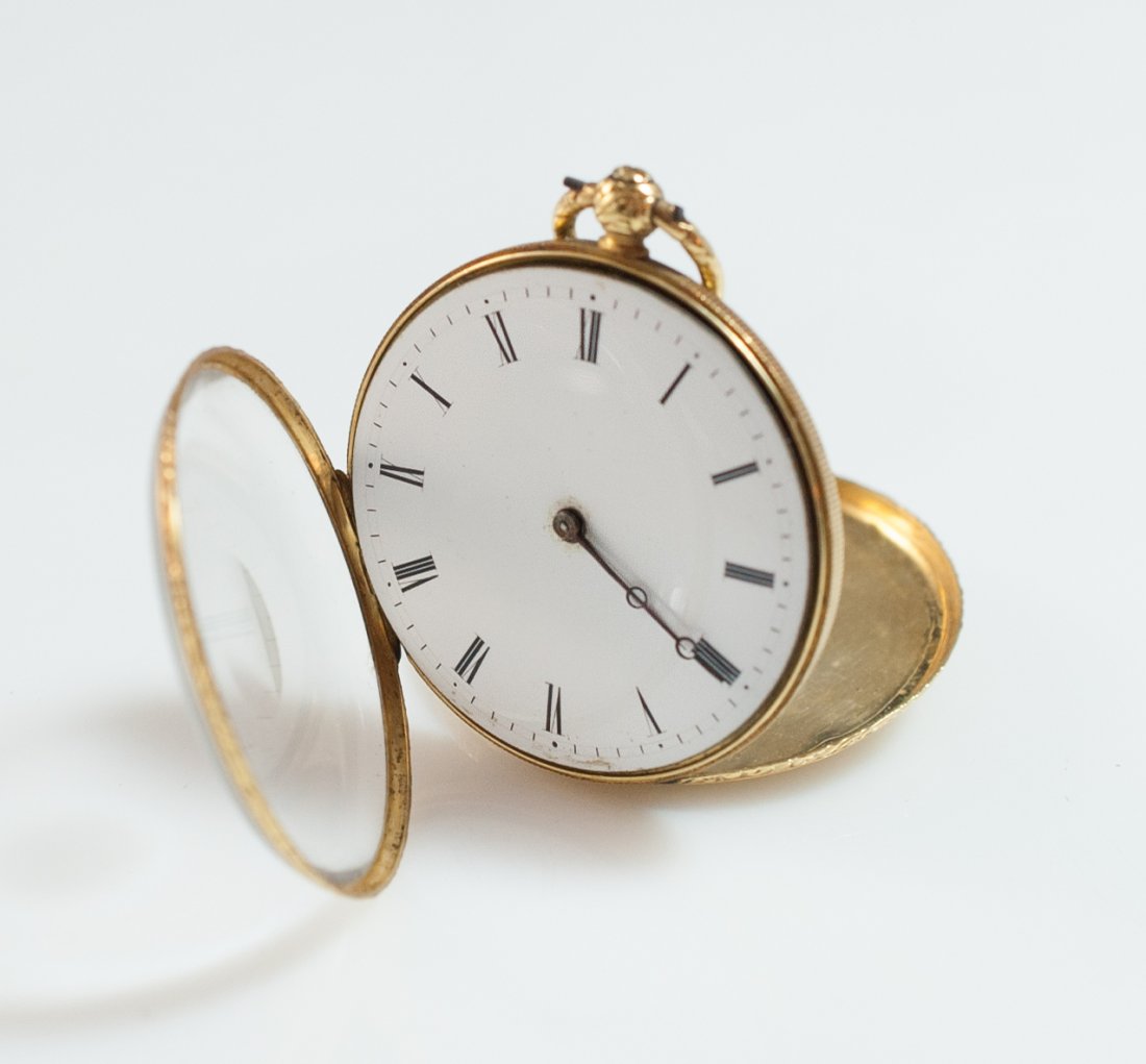 Vacheron Constantin Gold Pocket Watch: DESCRIPTION: 18k yellow gold Vacheron pocket watch with features white porcelain enamel dial steel hands with roman numerals the bordering is decorated with floral designs while the back includes hall