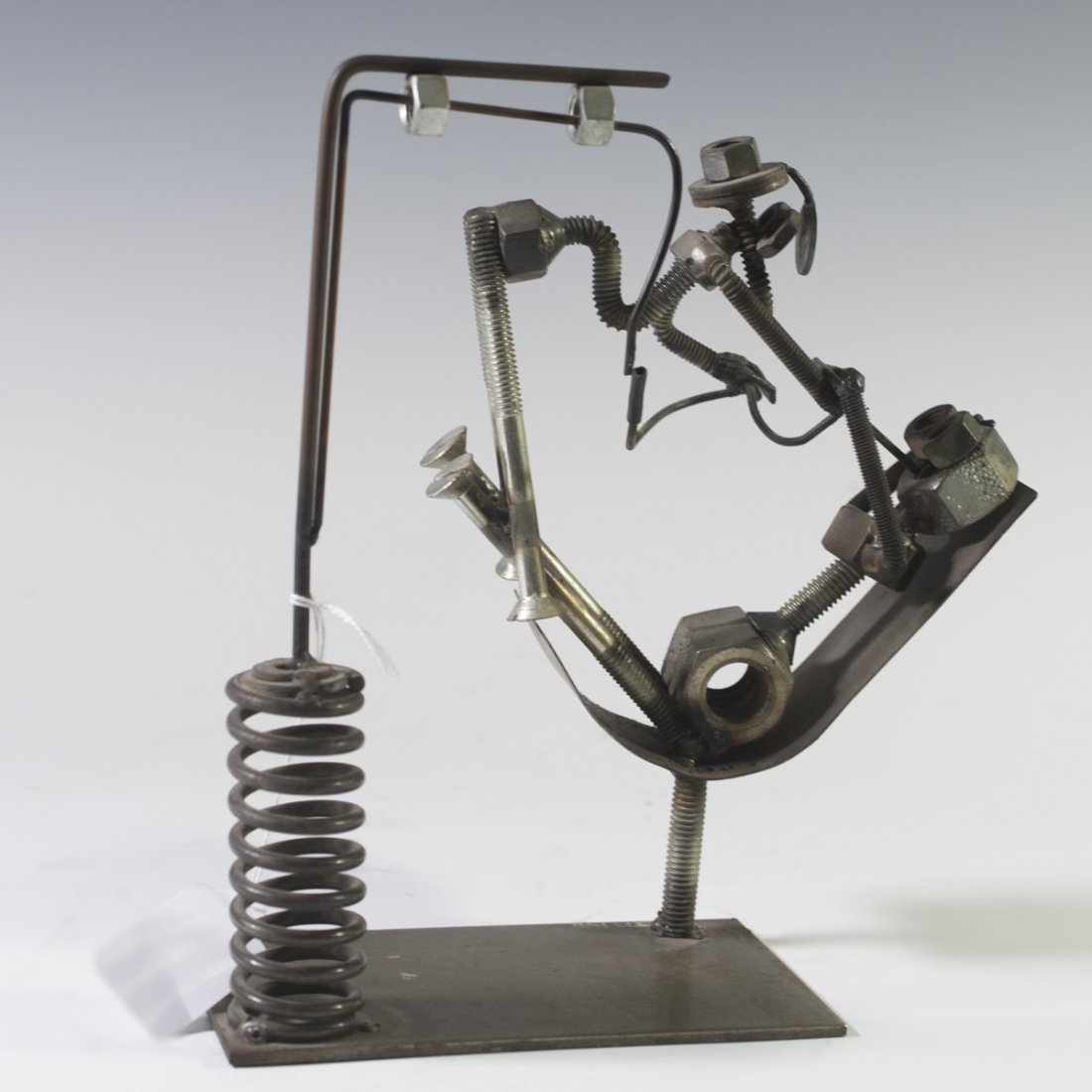 Steampunk Sculpture: DESCRIPTION:Fantastic steampunk sculpture comprised of bolts, nuts, screws, springs, and intricately detailed wiring. Features a figure on top of another figure laying on a metallic bed. Signed:"Jay 7