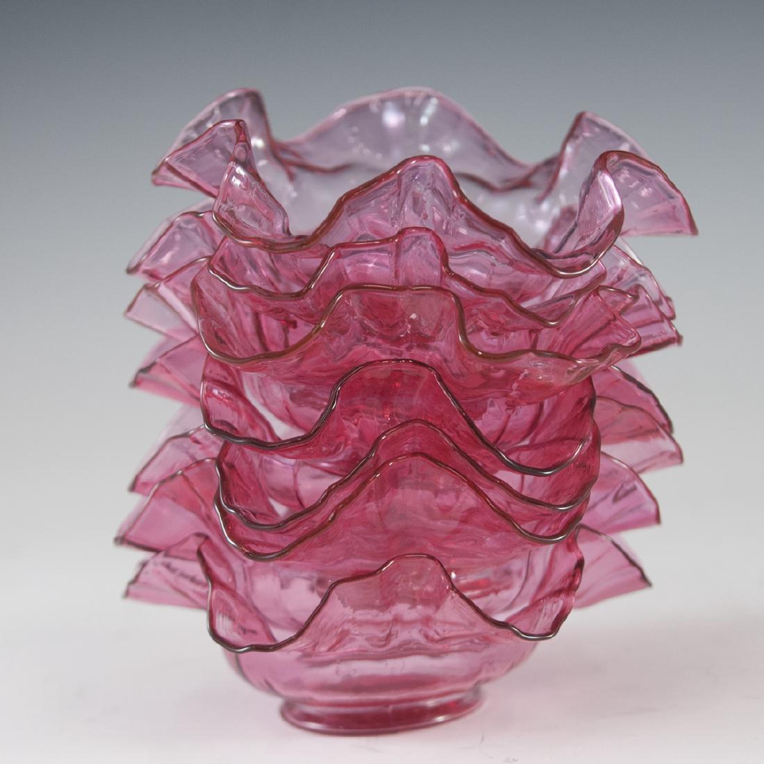 Victorian Cranberry Glass Sorbet Dishes: DESCRIPTION: Set of 7 cranberry Victorian glass sorbet dishes. Features a rich cranberry hue along with folded edges and wave form designs. CIRCA: Late 19th-Early 20th Ct. ORIGIN: USA DIMENSIONS:H:2.2