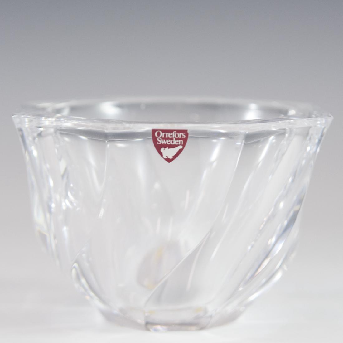 Orrefors Crystal "Residence" Bowl: DESCRIPTION: An Orrefors "Residence" patterned crystal bowl. Features a spiraled design with a scalloped center. Marked:"Orrefors". CIRCA: 20th Ct. ORIGIN: Sweden DIMENSIONS:H:3.15" Diameter:5" CONDIT