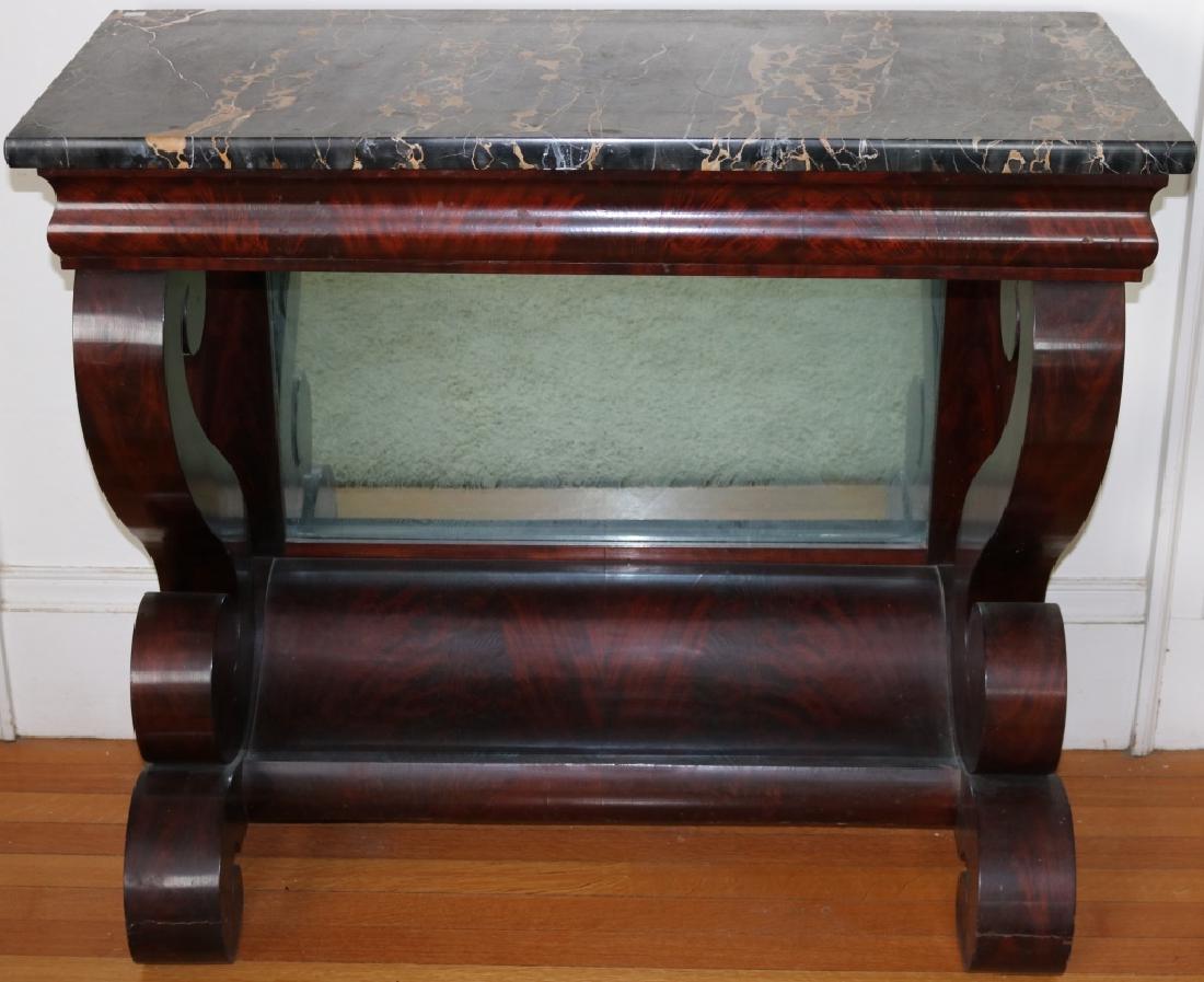 1830 AMERICAN EMPIRE PIER TABLE, PROBABLY BOSTON,: BLACK MARBLE TOP (MARBLE SHOWS REPAIR). MAHOGANY VENEER, PINE SECONDARY WOOD, MIRRORED BACK. 40 1/2" LONG, 18 1/4" DEEP, 35" HIGH. PROVENANCE: FAIRHAVEN COLONIAL CLUB. FROM HOME OF SUSAN AND SARAH WIL