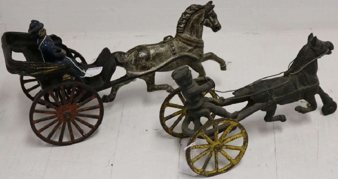 2 HORSE DRAWN TOYS TO INCLUDE: ONE IS A LADY: IN A SURREY, 5 1/2" HIGH, 12" LONG, WITH WORN ORIGINAL PAINT ALONG WITH SULKY RIDER WITH HORSE, 5" HIGH, 8 1/2" LONG, WORN ORIGINAL PAINT.