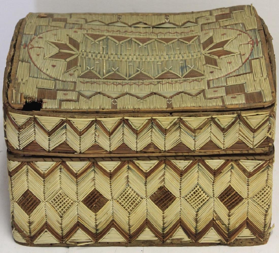 ANTIQUE NATIVE AMERICAN QUILL-WORK BOX, WOODLANDS: MICMAC TRIBE, 19TH C, CEDAR BOX WITH QUILLWORK AND BARK COVERING, GEOMETRIC DESIGN. TOP OF COVER IS DETACHED. LOSS TO CORNER. 7" HIGH, 10" WIDE, 8" DEEP.