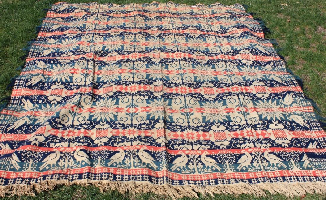 1844 JACQUARD WOVEN COVERLET SIGNED HOERR, HARM,: NY, 1844. BIRD AND TREE BORDER WITH GEOMETRIC FLORAL DESIGN. 6' X 7' 6". EXCELLENT CONDITION.