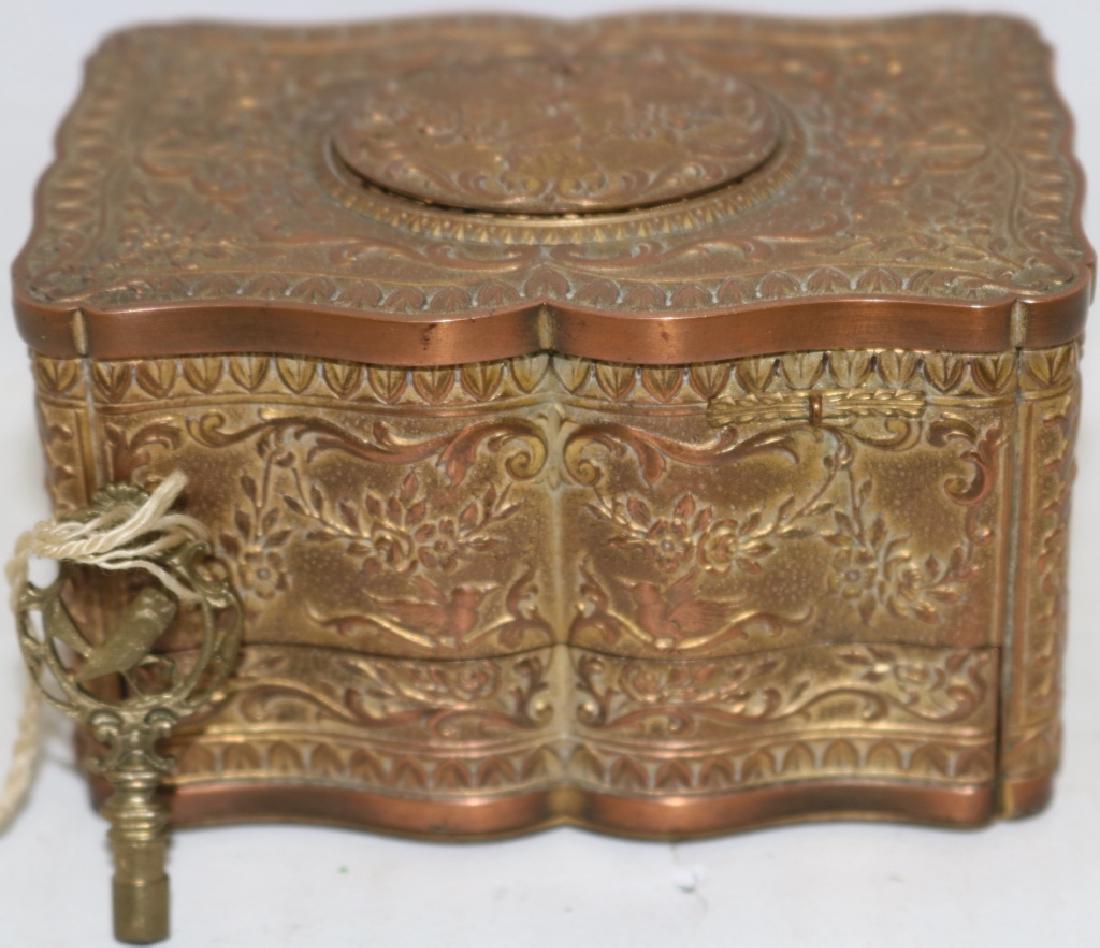 LATE 19TH C SINGING BIRD AUTOMATON, MARKED: BREGUET, FRANCE 3718, EMBOSSED GILT BRONZE CASE, ORIGINAL BIRD FORM KEY. WORKING CONDITION. 2 3/8" HIGH, 4" WIDE, 2 5/8" DEEP.CLICK HERE FOR VIDEO OF WORKING AUTOMATON