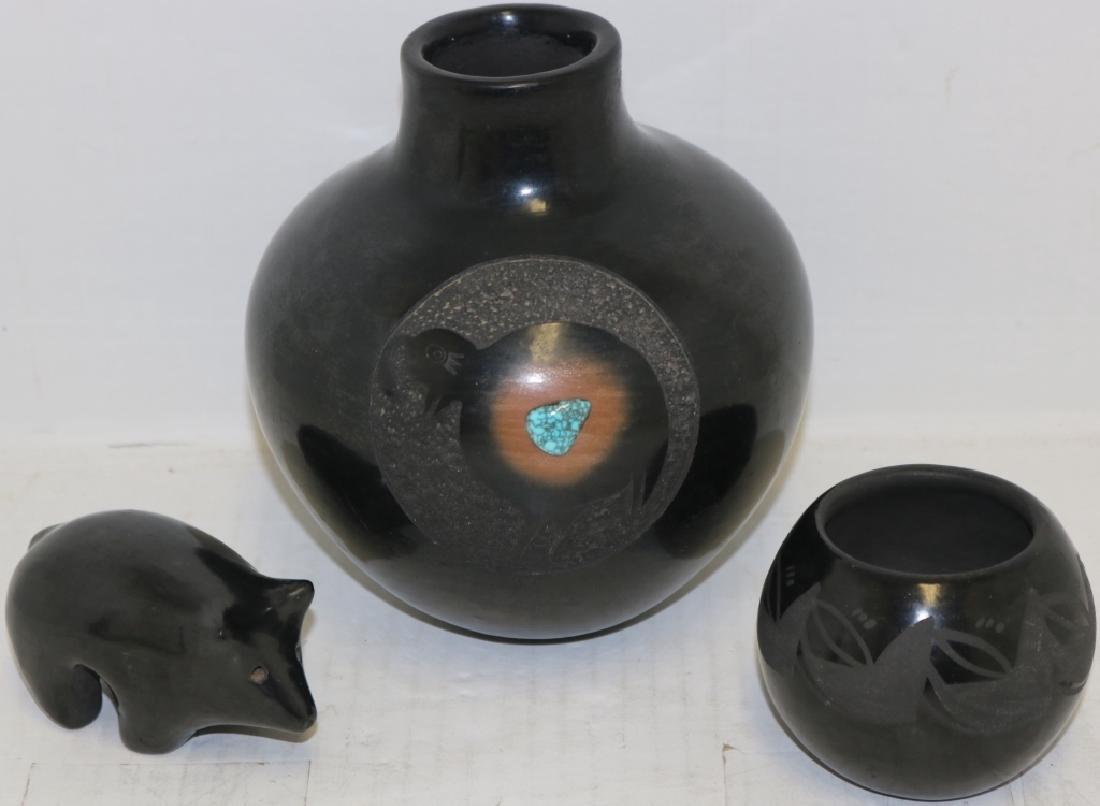 THREE BLACK ON BLACK NATIVE AMERICAN POTTERY PCS,: 20TH C, TO INCLUDE A RUSSELL SANCHEZ, AGE 20, VASE, SAN ILDEFONSO PUEBLO N.M., ENGRAVED DESIGN WITH BIRD AND TURQUOISE. A FIGURE OF A BEAR 4" LONG, INITIALED J.D.T. A 2 1/2" BOWL SIGNED BIRDELL, SANTA
