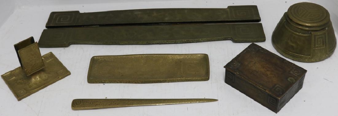 7 PIECE TIFFANY BRONZE DESK SET TO INCLUDE: A 3 1/2" HIGH INK WELL WITH INSERT, 4 3/4" WIDE HINGED LID BOX, 10 1/2" LETTER OPENER, 9 1/2" PEN TRAY, 3 1/2" HIGH MATCH HOLDER, TWO 19 1/4" BLOTTER ENDS. GOOD CONDITION.