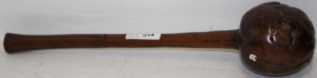 FIJI ISLANDS THROWING CLUB, 19TH C, WITH RARE: INSET HUMAN TOOTH. MADE FROM ROOTSTOCK. INTRICATE CARVING ON HANDLE, 16" LONG.