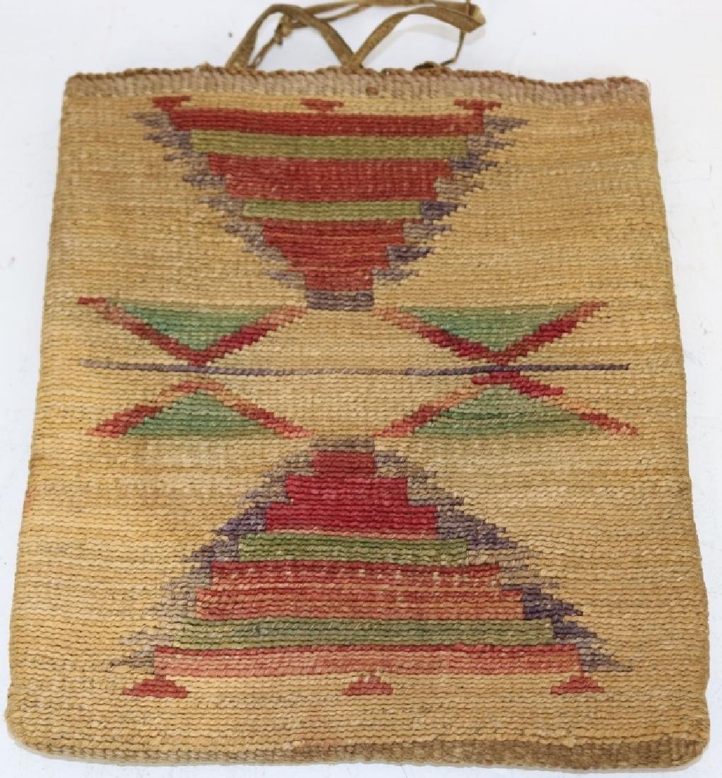 LATE 19TH CENTURY CORN HUSK BAG WITH IMBRICATED: YARN IN A GEOMETRIC DESIGN, 8 3/4" X 7 1/2".